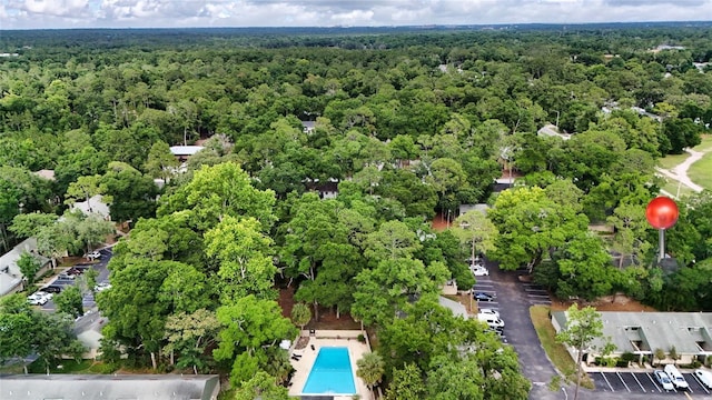 7200 SW 8th Ave Unit Q106, Gainesville, FL 32607 - bird's eye view of a forest and a pool