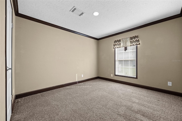 empty room featuring ornamental molding, carpet floors, a textured ceiling, and baseboards