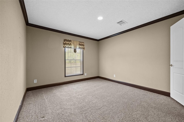 carpeted spare room with ornamental molding, baseboards, a textured ceiling, and recessed lighting