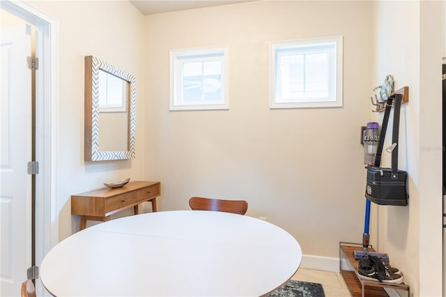 3242 NW 23rd Rd, Gainesville, FL 32605 - dining area featuring baseboards