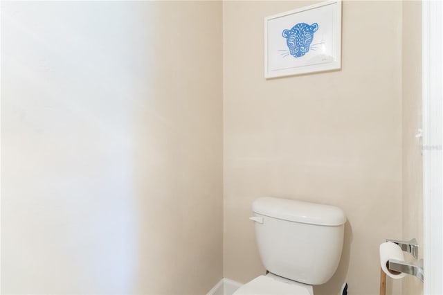 3242 NW 23rd Rd, Gainesville, FL 32605 - bathroom with toilet and baseboards