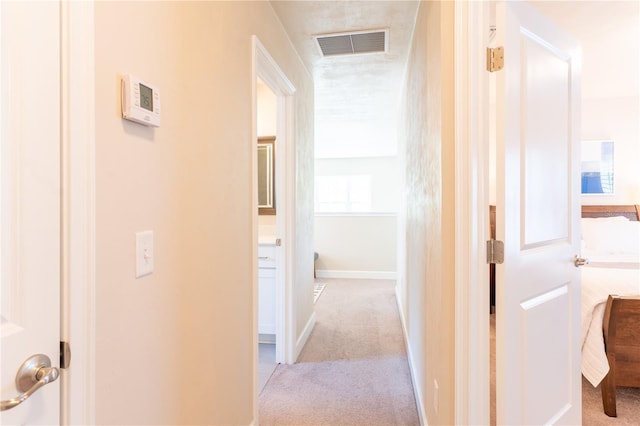 3242 NW 23rd Rd, Gainesville, FL 32605 - corridor featuring light carpet and baseboards