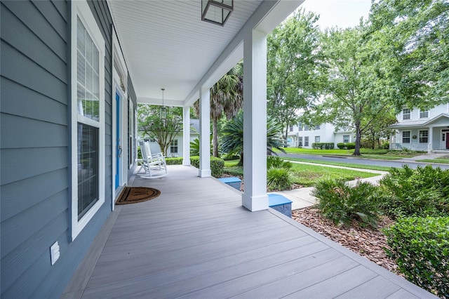 13209 SW 3rd Ln, Newberry, FL 32669 - deck featuring a porch