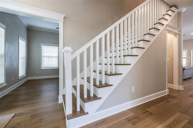 13209 SW 3rd Ln, Newberry, FL 32669 - staircase featuring baseboards, wood finished floors, and ornamental molding