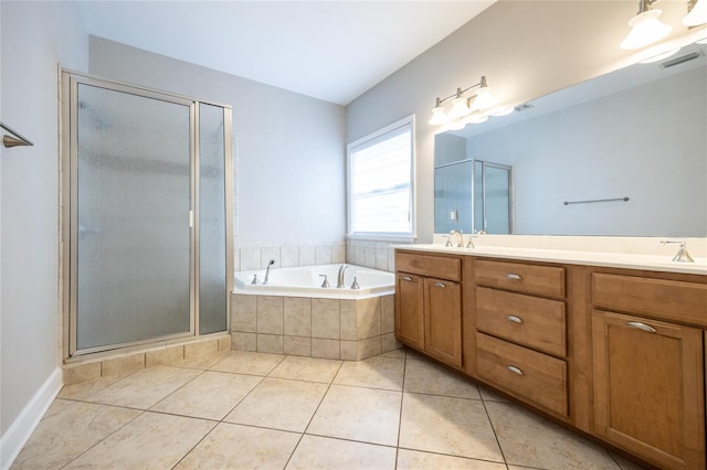 13209 SW 3rd Ln, Newberry, FL 32669 - bathroom featuring a shower stall, double vanity, a bath, and tile patterned floors