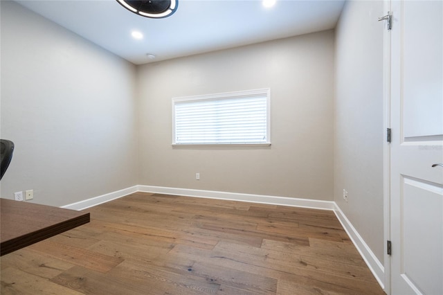 13209 SW 3rd Ln, Newberry, FL 32669 - unfurnished office featuring wood finished floors, baseboards, and recessed lighting