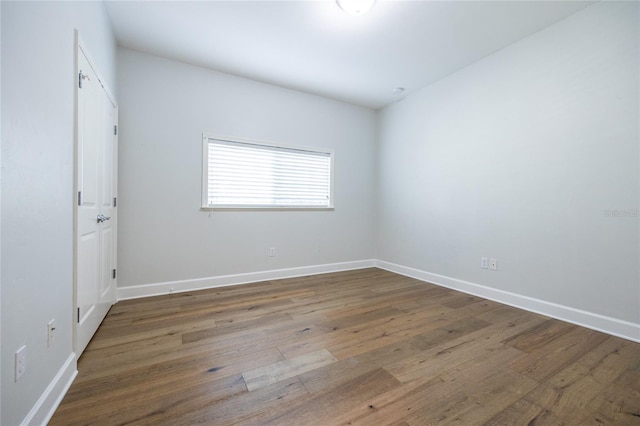 13209 SW 3rd Ln, Newberry, FL 32669 - spare room featuring wood finished floors and baseboards