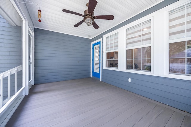 13209 SW 3rd Ln, Newberry, FL 32669 - unfurnished sunroom featuring a ceiling fan