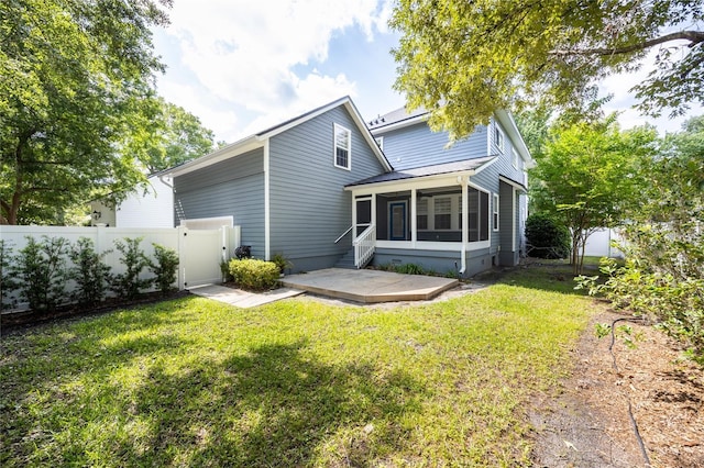 13209 SW 3rd Ln, Newberry, FL 32669 - view of front of house featuring a sunroom, a patio, and a gate