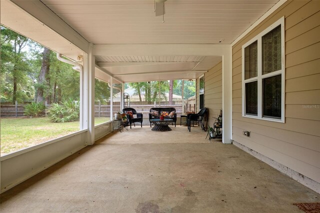 view of patio with fence and an outdoor living space