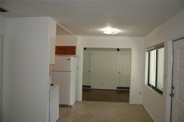1226 NE 17th Ave, Gainesville, FL 32609 - hallway featuring dark speckled floor