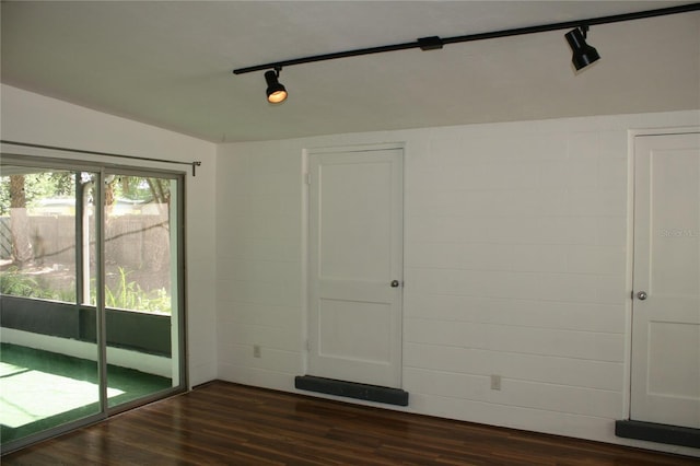 1226 NE 17th Ave, Gainesville, FL 32609 - spare room with track lighting and dark wood-style floors