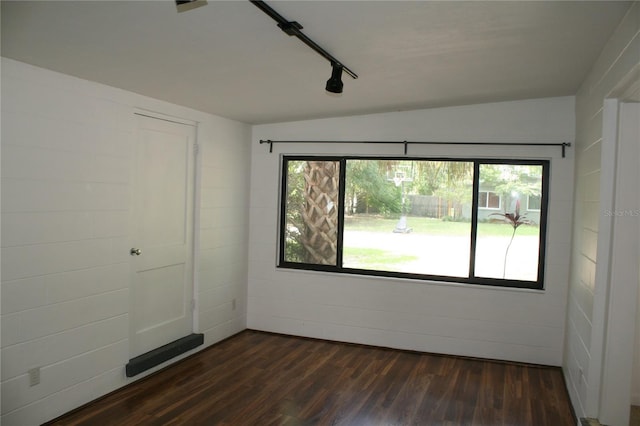 1226 NE 17th Ave, Gainesville, FL 32609 - empty room featuring dark wood-type flooring and rail lighting