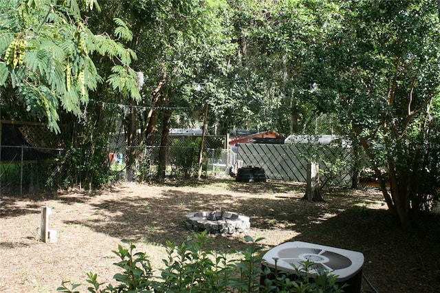 1226 NE 17th Ave, Gainesville, FL 32609 - view of yard featuring a fire pit