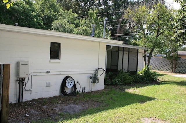1226 NE 17th Ave, Gainesville, FL 32609 - view of property exterior featuring tankless water heater