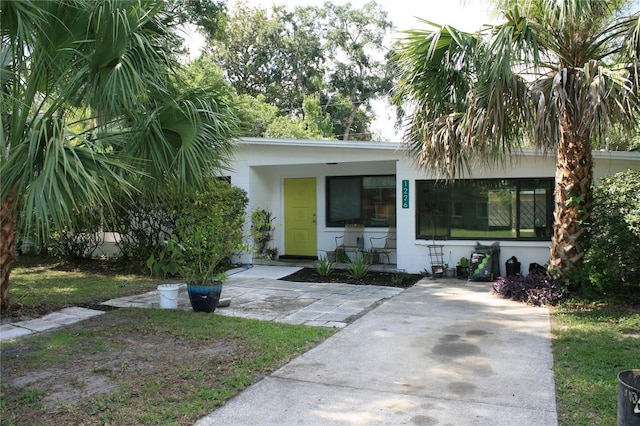 1226 NE 17th Ave, Gainesville, FL 32609 - view of front of home featuring covered porch