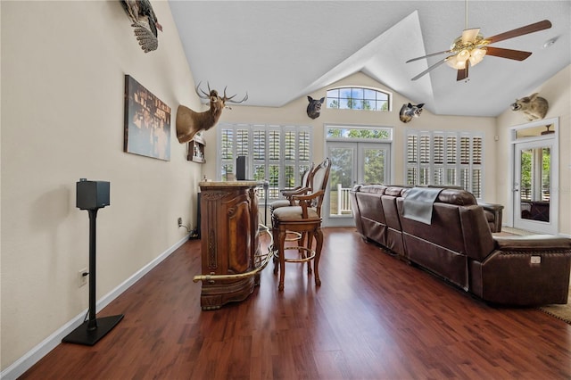 living room with vaulted ceiling, dark wood-style floors, french doors, baseboards, and ceiling fan