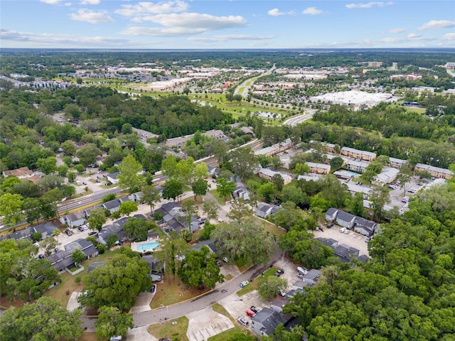 aerial view of property's location featuring nearby suburban area