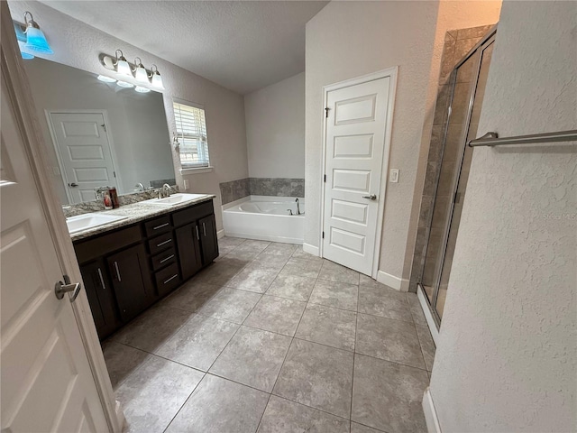 15835 NW 123rd Ave, Alachua, FL 32615 - bathroom with a textured wall, a textured ceiling, tile patterned floors, a stall shower, and a bath