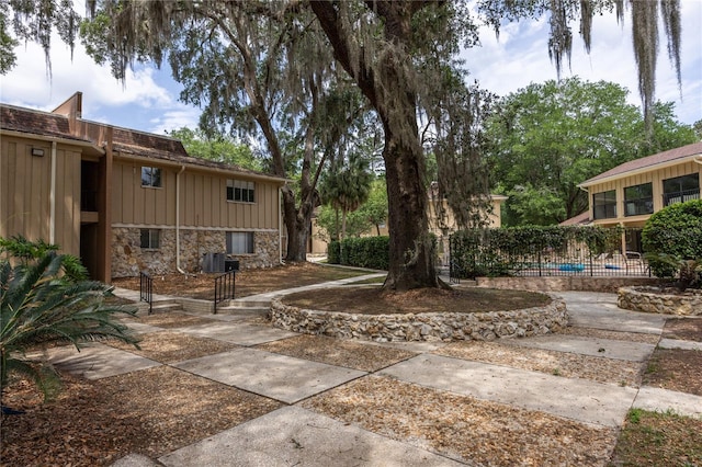 507 NW 39th Rd Unit 235, Gainesville, FL 32607 - view of yard featuring fence and cooling unit