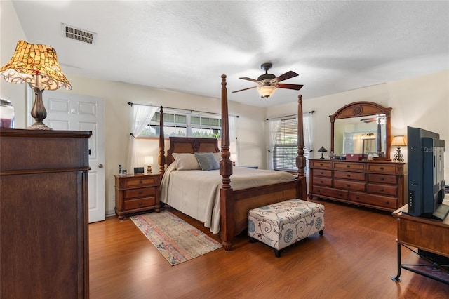 7450 SE State Road 121, Morriston, FL 32668 - bedroom with wood finished floors and ceiling fan