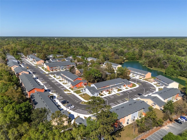 1601 NW 29th Rd Unit 2, Gainesville, FL 32605 - drone / aerial view of a forest and a large body of water
