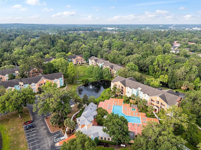 2601 SW Archer Rd Unit G 128, Gainesville, FL 32608 - bird's eye view of a forest, a large body of water, and a pool area