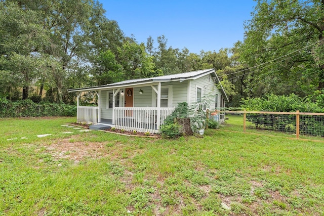 2529 SE 11th Ave, Gainesville, FL 32641 - view of front facade featuring a porch and metal roof