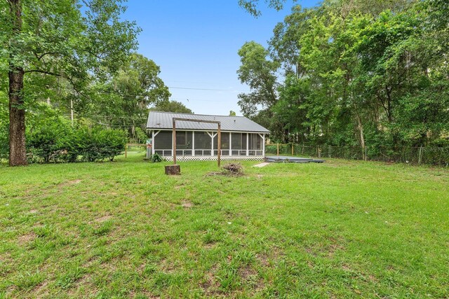 2529 SE 11th Ave, Gainesville, FL 32641 - view of yard featuring a sunroom