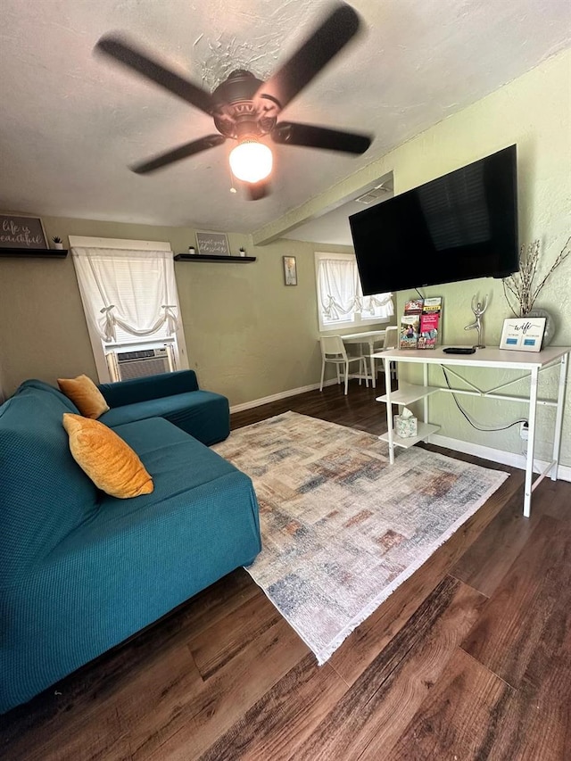 2529 SE 11th Ave, Gainesville, FL 32641 - living room with wood finished floors, ceiling fan, baseboards, and cooling unit