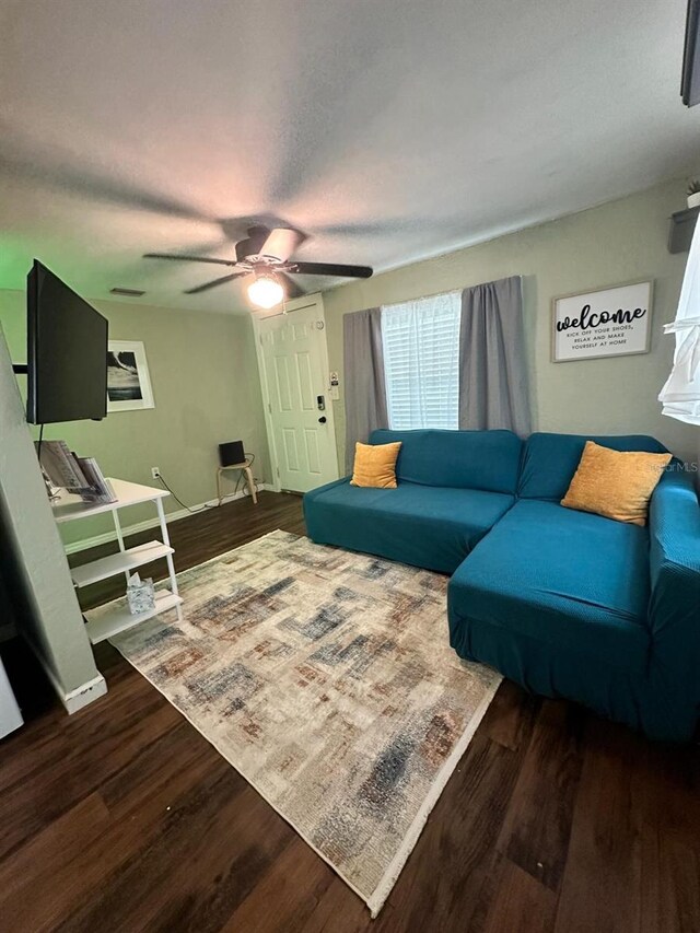 2529 SE 11th Ave, Gainesville, FL 32641 - living area featuring wood finished floors and ceiling fan