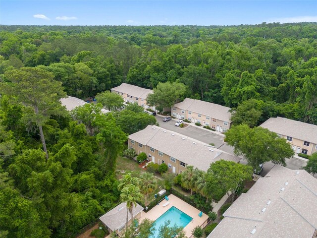 4415 SW 34th St Unit 503, Gainesville, FL 32608 - bird's eye view of a forest and a pool