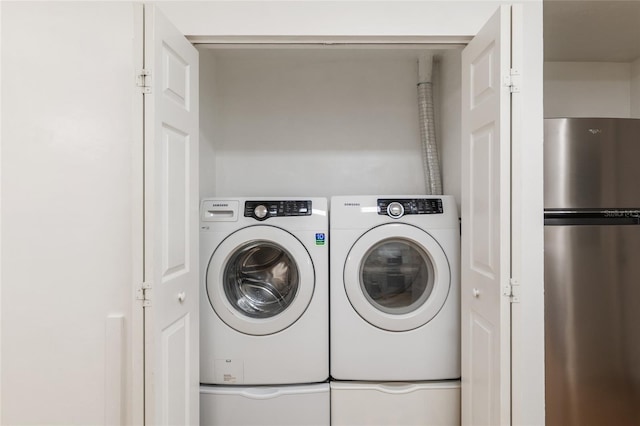 4415 SW 34th St Unit 503, Gainesville, FL 32608 - laundry area with washing machine and dryer