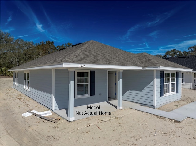 1926 N Roberts Trl, Bell, FL 32619 - view of front of house with a shingled roof and covered porch