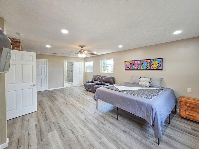 7972 State Rd Unit 100, Keystone Heights, FL 32656 - bedroom with wood finished floors, recessed lighting, baseboards, ceiling fan, and a textured ceiling