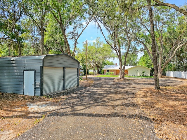 7972 State Rd Unit 100, Keystone Heights, FL 32656 - garage featuring a storage unit