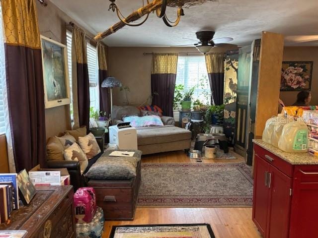 6410 SW 170th St, Archer, FL 32618 - sitting room featuring light wood finished floors and a ceiling fan