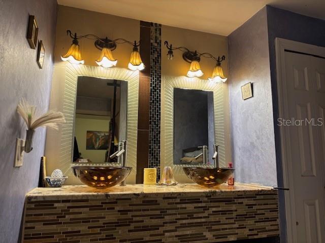 6410 SW 170th St, Archer, FL 32618 - bathroom with a sink and a textured wall