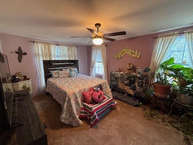 6410 SW 170th St, Archer, FL 32618 - bedroom with ceiling fan and carpet floors