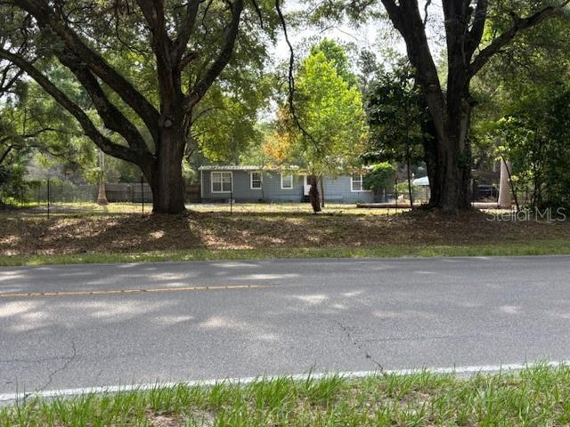 6410 SW 170th St, Archer, FL 32618 - obstructed view of property with fence