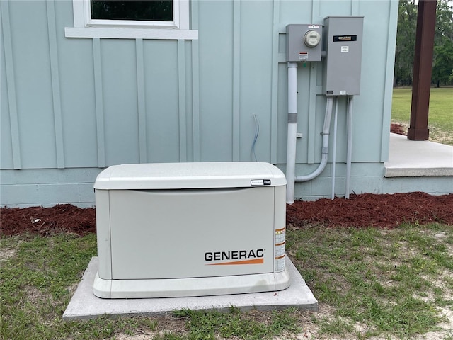 exterior view of a power unit, board and batten siding, and electric meter