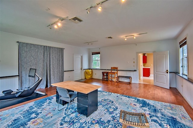20250 NW 71st Ct, Micanopy, FL 32667 - living area with track lighting, wood finished floors, and wainscoting