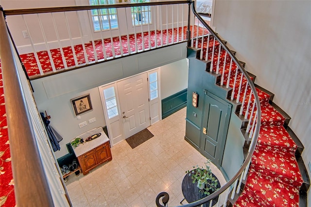 20250 NW 71st Ct, Micanopy, FL 32667 - foyer entrance featuring stairs and healthy amount of natural light