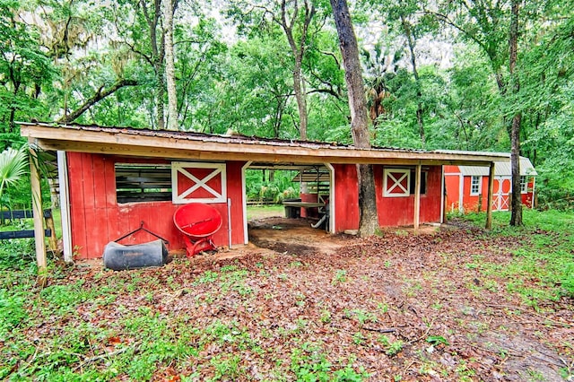 20250 NW 71st Ct, Micanopy, FL 32667 - view of outdoor structure featuring an outbuilding