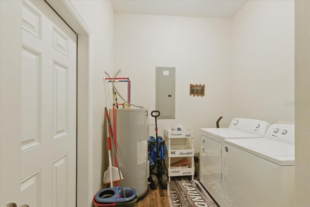 1180 Hough St, Bell, FL 32619 - laundry area with electric panel, washing machine and dryer, water heater, and wood finished floors