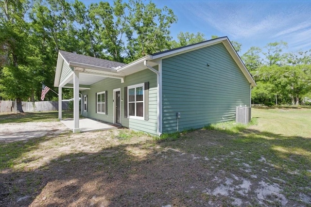 1180 Hough St, Bell, FL 32619 - view of home's exterior featuring a patio and central air condition unit