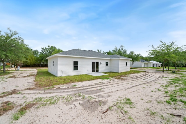 3645 Frederick Ave, Bell, FL 32619 - rear view of house with dirt driveway