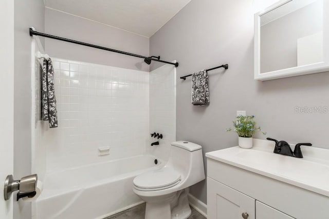 2911 NE 17th Ter, Gainesville, FL 32609 - bathroom with toilet, vanity, and tub / shower combination