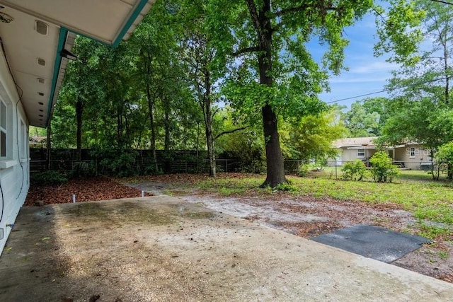 2911 NE 17th Ter, Gainesville, FL 32609 - view of yard featuring a patio and fence