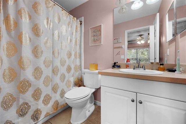 2636 SW 35th Pl Unit 21, Gainesville, FL 32608 - bathroom featuring tile patterned flooring, vanity, toilet, a shower with curtain, and ceiling fan